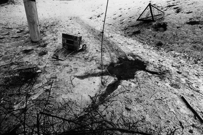 Grozny. January 1995. Food and water supplies stopped within days of the assault. Men and women searched for sustenance among exploding shells. Gaining control of Grozny did not take the Russians hours, but weeks. The Chechens were difficult to beat because they did not engage in conventional warfare. During the siege the bulk of the rebels were training south of the city; General Maskhadov knew that a large, poorly armed force could have been ring-fenced and trapped with relative ease. Most importantly, previous city surveyors and town planners were now fighters, giving the Chechen command intimate knowledge of the hidden arteries and conduits of the city?s gas and water systems. Day and night they infiltrated Russian lines with hundreds of three-man hit teams popping out of nowhere, typically two riflemen protecting a fighter with anti-tank rockets. Countless Russian armoured personnel carriers were destroyed at intersections and strategic points with huge casualties.